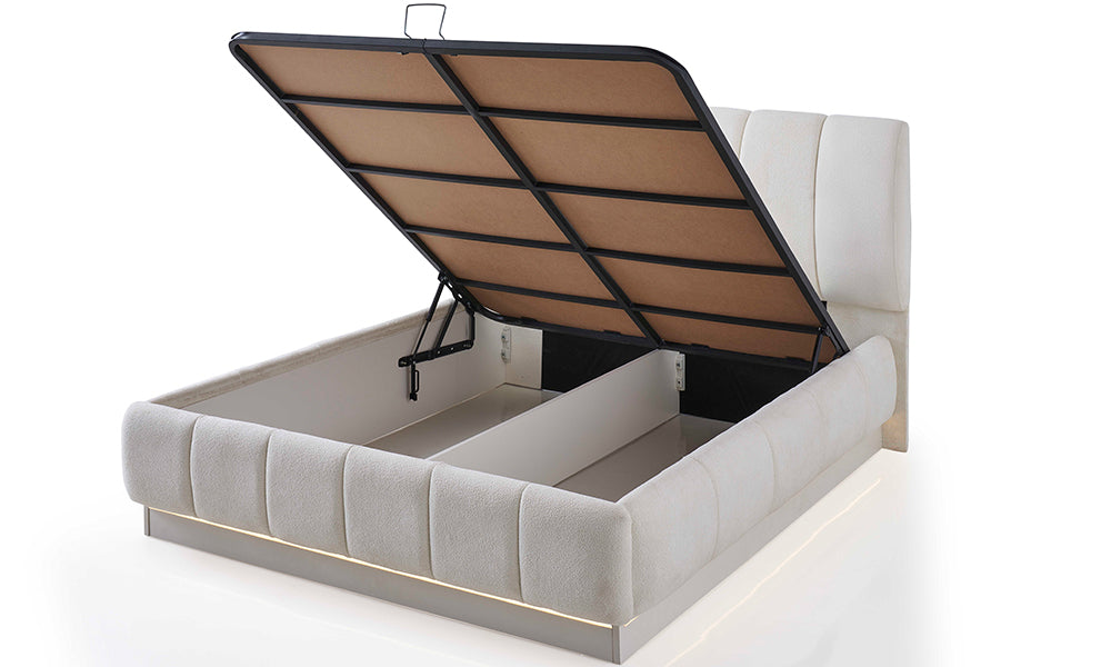 Asel Modern Karyola açık baza profili; beyaz buklet kumaş gövde, çift amortisörlü çelik konstrüksiyon mekanizması ve geniş depolama hacmi.