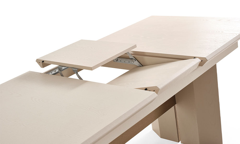 İpek Modern Yemek Masası'nın pürüzsüz üst tablasındaki dayanıklı merkezi açılır uzatma mekanizmasının pratik detayı.