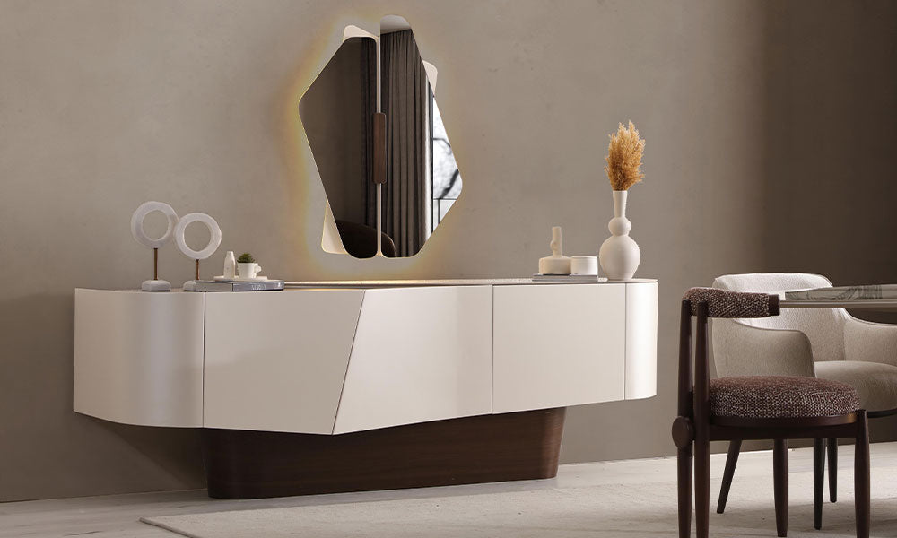 Narin Modern Konsol; asimetrik beyaz gövdeli, koyu ahşap bazalı ve LED arka aydınlatmalı asimetrik aynalı modern salon görünümü.