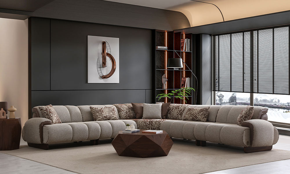 Nois Modern modüler köşe koltuk takımının lüks ve modern bir salondaki tam takım görünümü; kanallı puf dikişli ve deri detaylı.