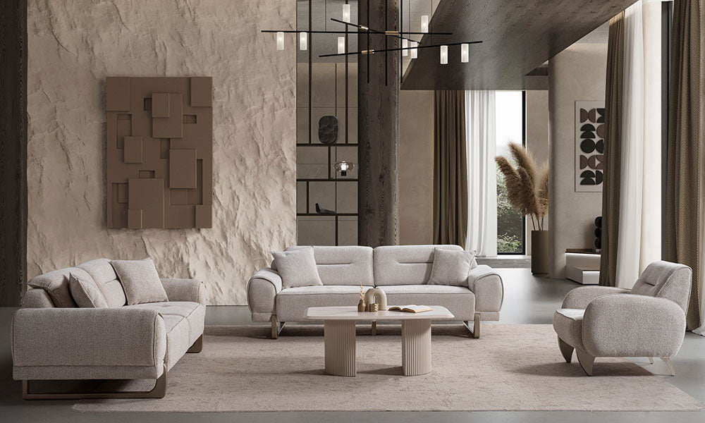 Rüya Modern Koltuk Takımı'nın lüks bir salondaki tam takım görünümü; kavisli ayaklı kanepeler ve heykelsi berjer.