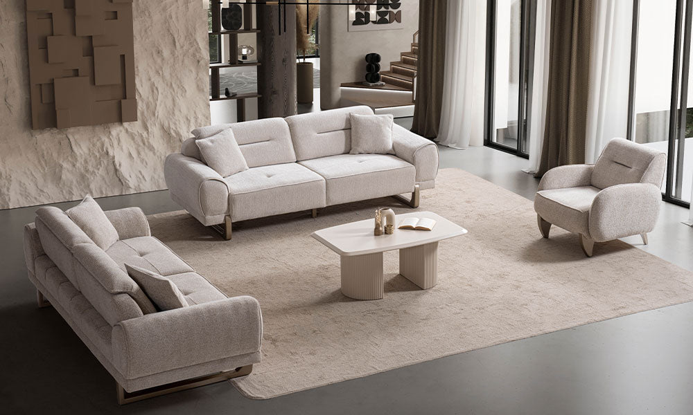 Rüya Modern Koltuk Takımı'nın kavisli hatlarını ve dokulu kumaş detaylarını gösteren modern salon duruşu.