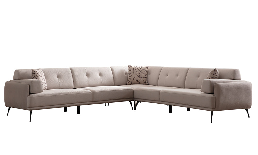 Venüs L köşe koltuk tam cephe görünümü; geniş lobi oturum kapasitesi, kapitoneli sırt minderleri ve modern minimalist form.