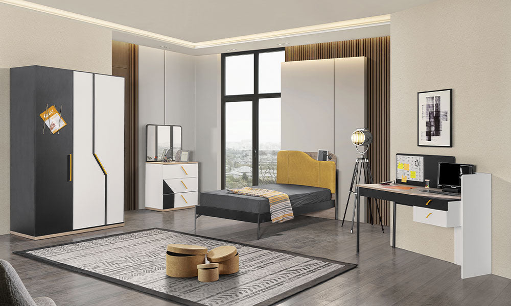 Zenit Modern Genç Odası Takımı; sarı asimetrik başlıklı karyola, pegboard detaylı çalışma masası, tekerlekli komodin ve siyah beyaz gardırop seti.