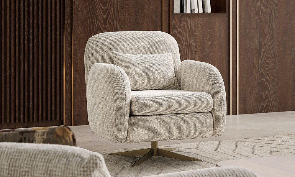 Candy Modern döner berjerin keten kumaş kaplı, yuvarlak hatlı ve gold metal ayaklı şık salon görünümü.