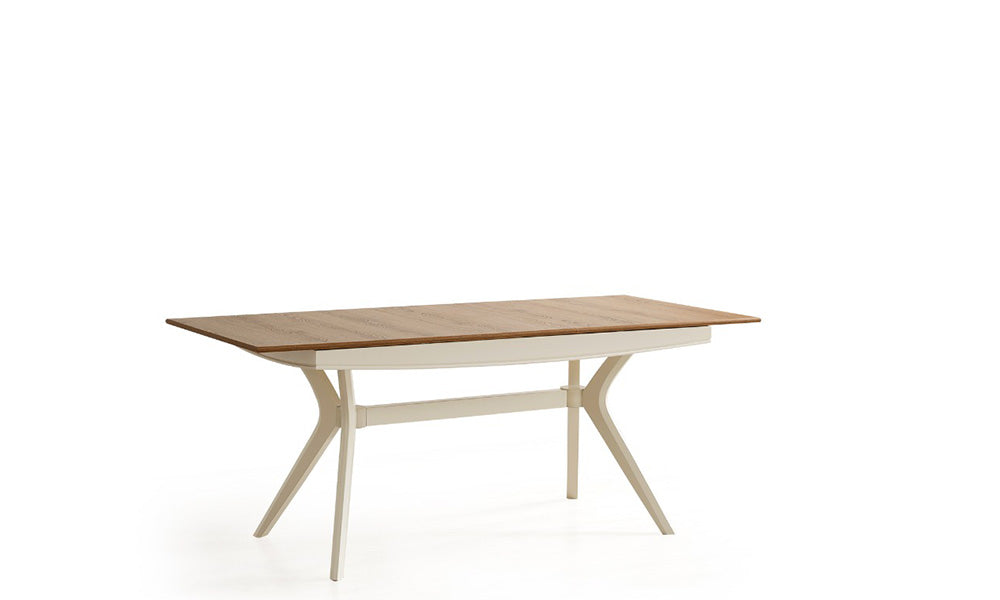 Selva Modern Yemek Masası'nın açılır mekanizmalı, doğal ahşap görünümlü üst tablası ve kavisli beyaz/krem renkli zarif ayak detayı.