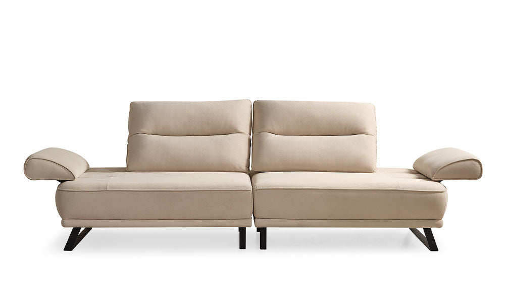 Krem rengi Velar Modern üçlü koltuğun, oturma derinliğini artıran sırt mekanizmaları açık haldeyken önden görünümü.