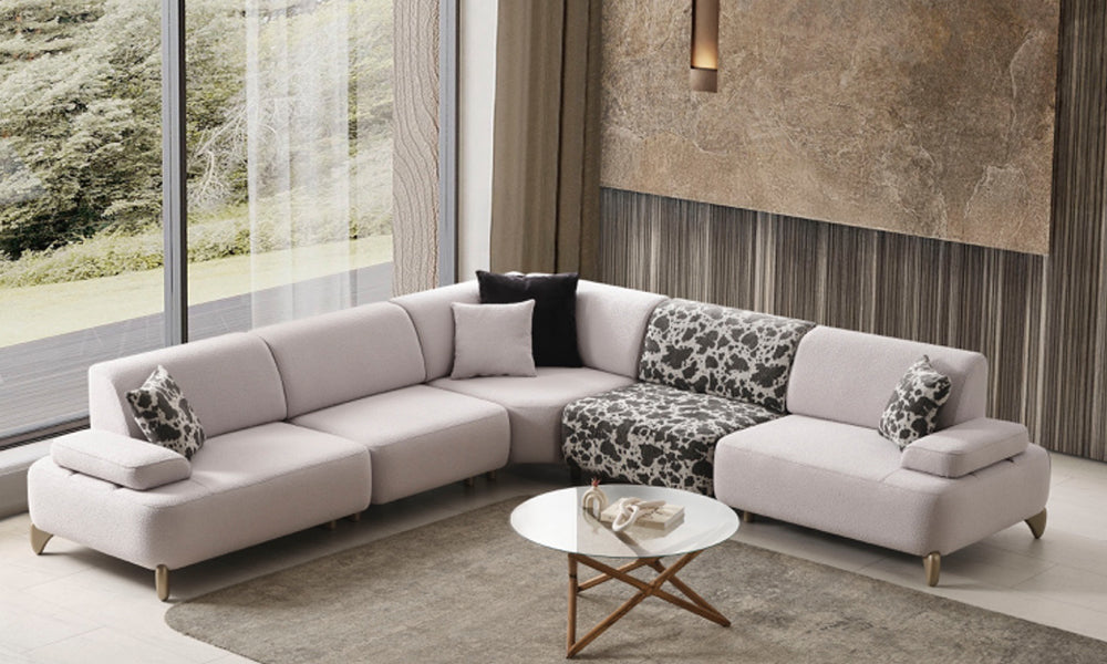Yıldız Modern Köşe Koltuk Takımı'nın modüler yapısı; bukle kumaş ve avangart desenli köşe modülünün geniş bir alandaki lüks görünümü.